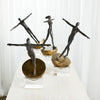 A grouping of finding balance sculptures together.