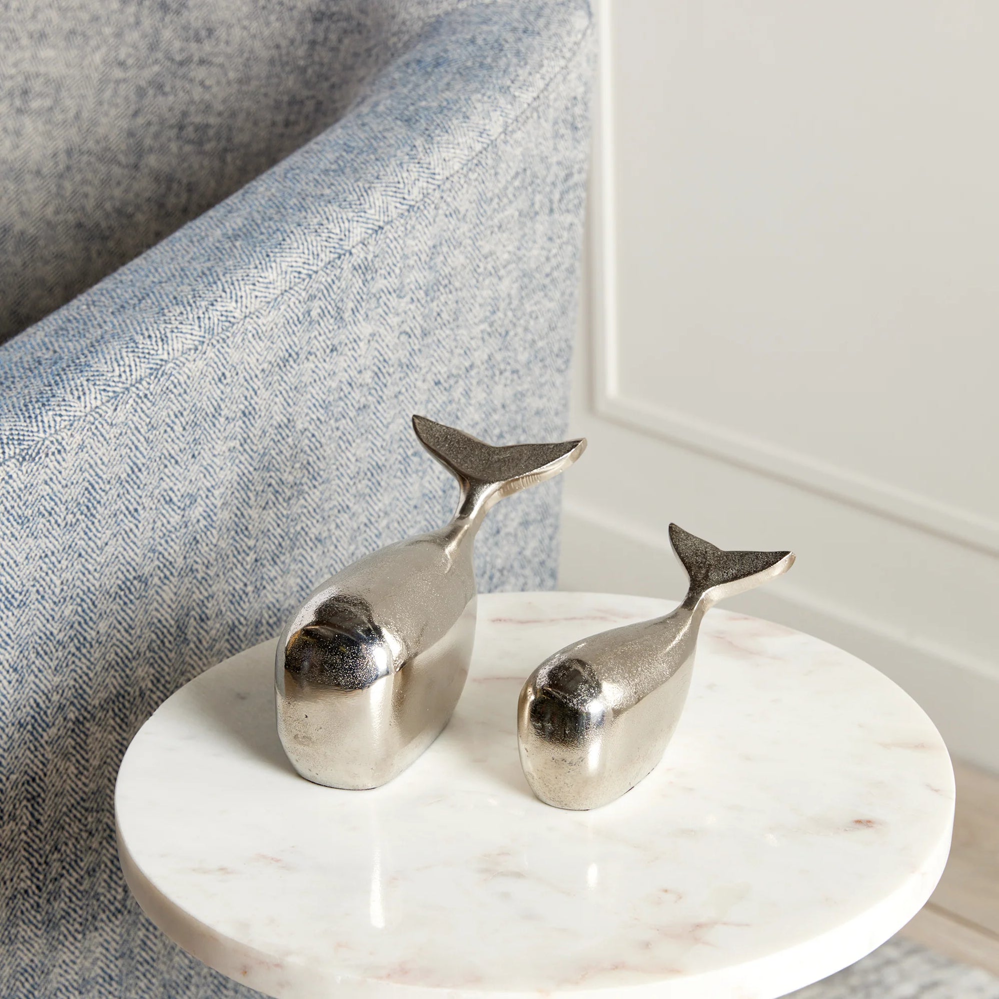 Moby Whale Sculptures on a table