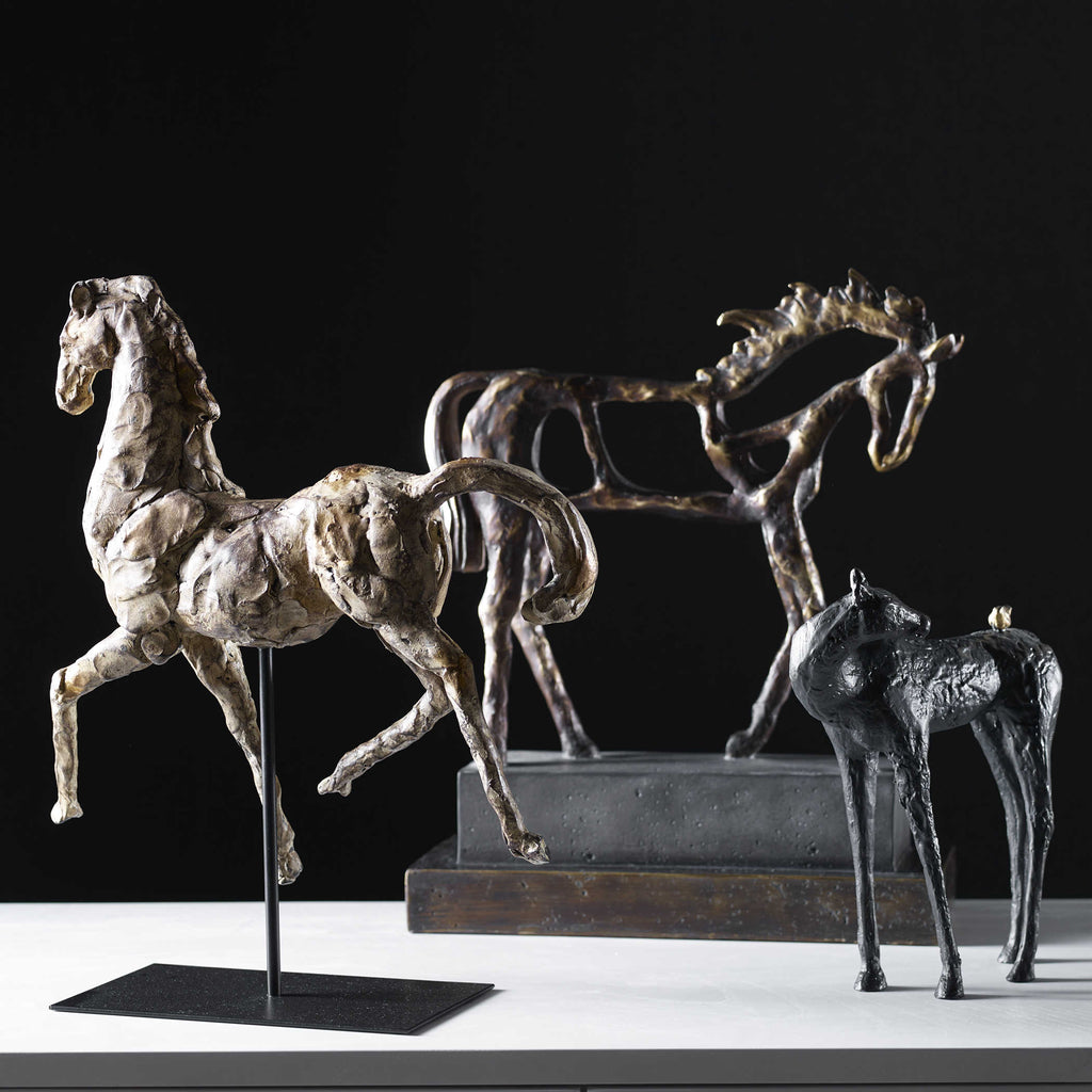 Horse and bird friend sculpture shown here with two other different horse sculptures from Uttermost.