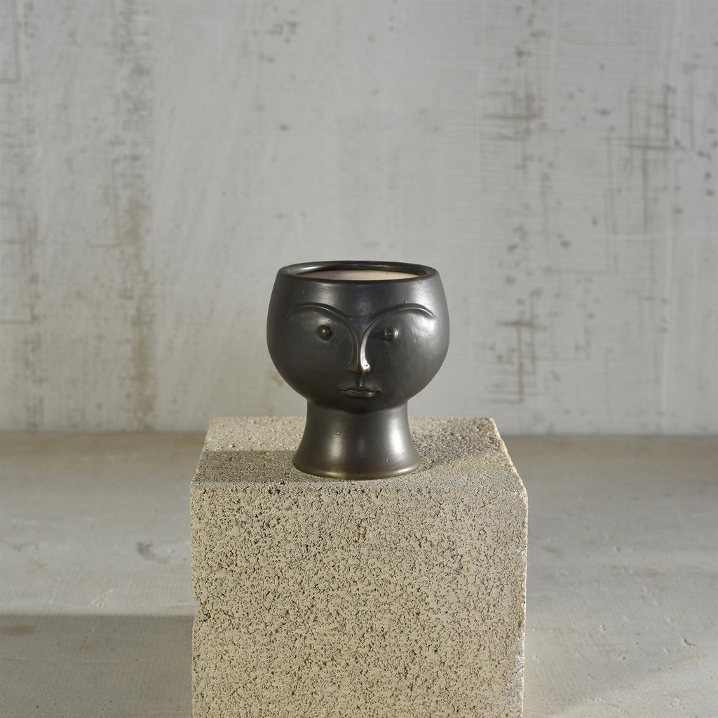 View of the Rory Ceramic Face Vase without a plant in it. 