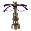 eye glasses sculpture stand, in a different style nose and mouth.